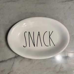 Authentic Rae Dunn small plate with the saying SNACK.